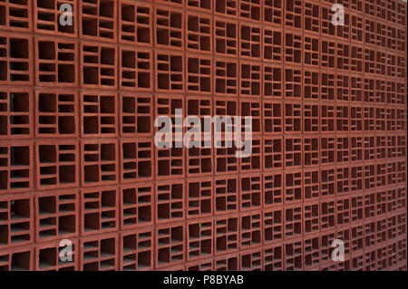 Red concrete block window shade on the church of Santo Cristo de Esquipulas in Santa Cruz, Costa Rica Stock Photo