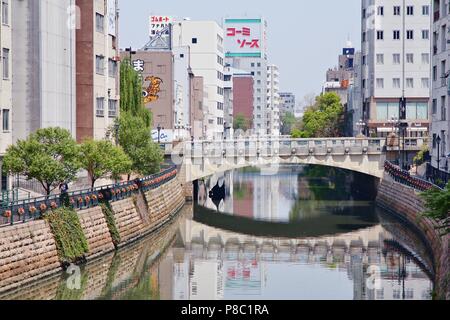 NAGOYA, JAPAN - APRIL 29, 2012: Horikawa river view in downtown Nagoya, Japan. With almost 9 million people Nagoya is the 3rd largest metropolitan are Stock Photo