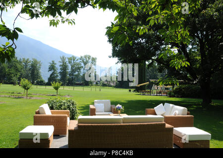 Switzerland: The giant park of the luxury hotel Castello del Sole in Ascona at Lago Maggiore in Ticino Stock Photo