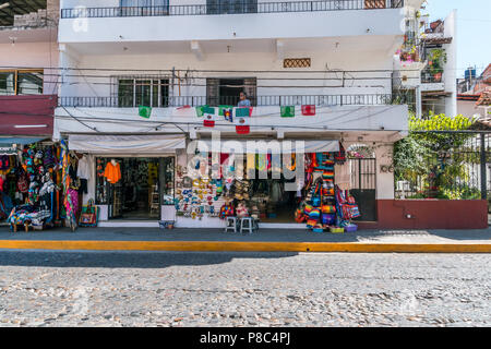 PUERTO VALLARTA, MEXICO - March 10 2018: Outdoor view of souvenir and gift store in the city streets of old Puerto Vallarta downtown. MX-JAL. Stock Photo