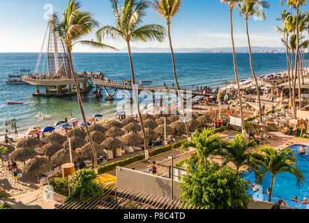 PUERTO VALLARTA, MEXICO - MARCH 10, 2018: Hustle and bustle  and lively activity on March 2018 in Los Muertos Beach, MX-JAL. Stock Photo