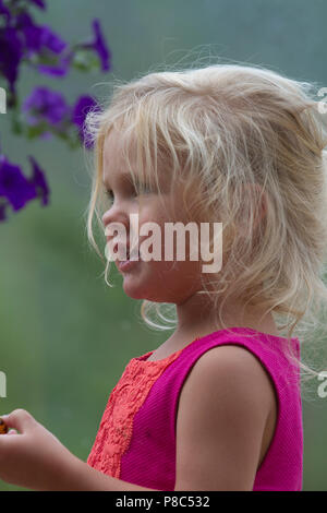 Pretty, blonde, preteen girl, profile, looking right to left. Model Release #114 Stock Photo