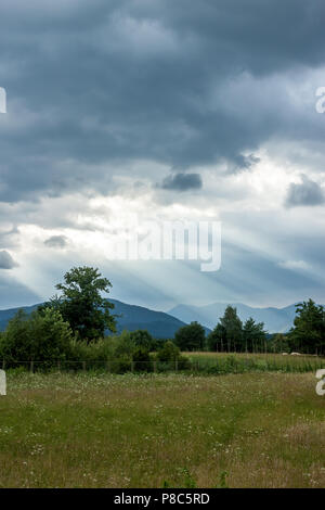 dramatic dark clouds landscape Stock Photo