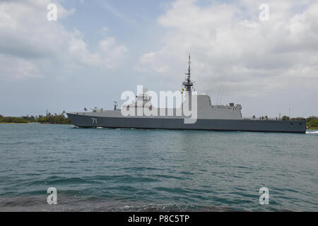 180710-N-OS584-0390 PEARL HARBOR (July 10, 2018) Republic of Singapore Navy (RSN) guided-missile frigate RSS Tenacious (71) departs Pearl Harbor to begin the at-sea phase of the Rim of the Pacific (RIMPAC) exercise, July 10. Twenty-five nations, 46 ships, five submarines, about 200 aircraft, and 25,000 personnel are participating in RIMPAC from June 27 to Aug. 2 in and around the Hawaiian Islands and Southern California. The world’s largest international maritime exercise, RIMPAC provides a unique training opportunity while fostering and sustaining cooperative relationships among participants  Stock Photo