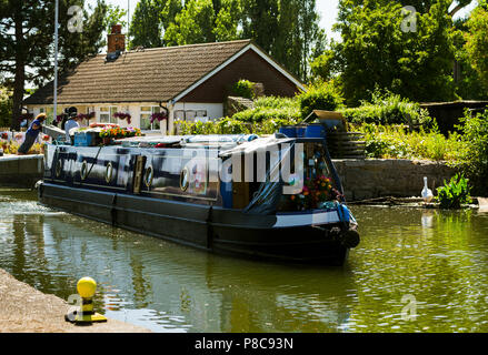 barge passing through Picketts lock on the Lee Valley waterway. London UK Stock Photo