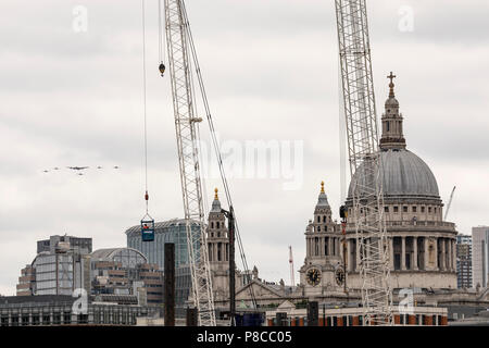 London, UK. 10th July, 2018. The Battle of Britain Memorial Flight, part of the RAF100 Flypast, passing St Pauls Cathedral on July 10th 2018 Credit: Nick Whittle/Alamy Live News Stock Photo