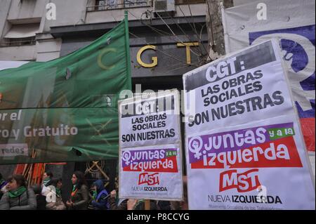 July 10, 2018 - Buenos Aires, Buenos Aires, Argentina - Pro abortion groups aligned with the Campaign for Free, Legal and Safe Abortion protest in front of the CGT (Confederation of Workers' Unions) demanding a meeting after the union leaders declared that their respective unions' medical centers cannot afford to perform free abortions in their facilities. Pro abortion groups see this statement as one of many ways ''pro life'' lobbies are using to put pressure on the Senate, scheduled to have the definitive vote on August 8. (Credit Image: © Patricio Murphy via ZUMA Wire) Stock Photo