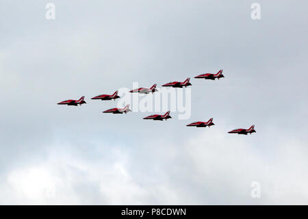 The Red Arrows fly in formation over the QE2 Olympic Park, as part of the RAF Centennial Celebrations Stock Photo