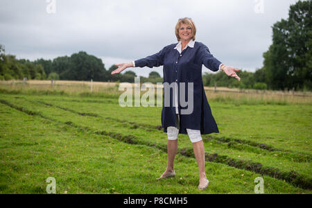 Buechten, Germany. 25th June, 2018. The presenter Alida Gundlach stands on a field. Gundlach celebrates her 75th birthday on 17 July. Credit: Philipp Schulze/dpa/Alamy Live News Stock Photo