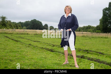 Buechten, Germany. 25th June, 2018. The presenter Alida Gundlach stands on a field. Gundlach celebrates her 75th birthday on 17 July. Credit: Philipp Schulze/dpa/Alamy Live News Stock Photo