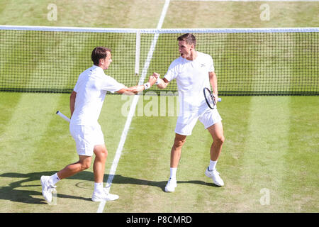 London, UK. 11th July, 2018. (L-R) Frederik Nielsen (DEN), Joe Salisbury (GBR) Tennis : (L-R) Frederik Nielsen of Denmark and Joe Salisbury of Great Britain during the Men's doubles quarter-final match of the Wimbledon Lawn Tennis Championships against Ben McLachlan of Japan and Jan-Lennard Struff of Germany at the All England Lawn Tennis and Croquet Club in London, England . Credit: AFLO/Alamy Live News Stock Photo