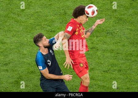 St. Petersburg, Russland. 11th July, 2018. Olivier GIROUD (left, FRA) versus Axel WITSEL (BEL), action, duels, header, France (FRA) - Belgium (BEL) 1: 0, semi-finals, match 61, on 10.07.2018 in St.Petersburg; Football World Cup 2018 in Russia from 14.06. - 15.07.2018. © | usage worldwide Credit: dpa/Alamy Live News Stock Photo