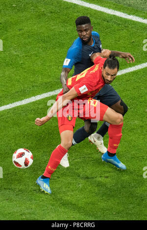 St. Petersburg, Russland. 11th July, 2018. Nacer CHADLI (vo., BEL) versus Samuel UMTITI (FRA), action, duels, France (FRA) - Belgium (BEL) 1: 0, semi-finals, match 61, on 10.07.2018 in St.Petersburg; Football World Cup 2018 in Russia from 14.06. - 15.07.2018. © | usage worldwide Credit: dpa/Alamy Live News Stock Photo