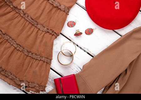 Close up brown women outfit, skirt and accessories. Stock Photo