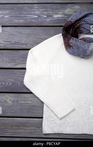 Close up white sweater and scarf. Stock Photo