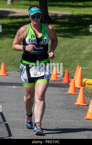 Emily Rydin competing in the run segment in the 2018 Stissing Triathlon Stock Photo
