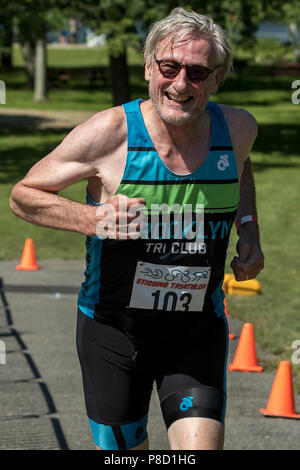 Richard Brotherton competiting in the run segment in the 2018 Stissing Triathlon Stock Photo
