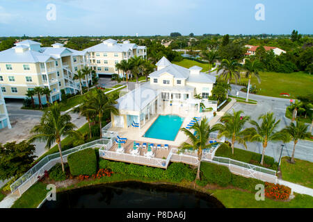 A community swimming pool complete with clubhouse for residents of a