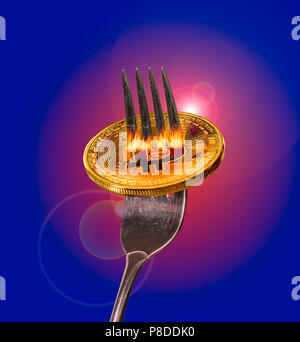 Single bitcoin macro image on fork to illustrate new blockchain Stock Photo