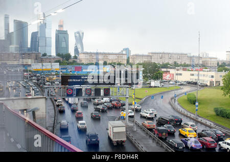 MOSCOW, RUSSIA - June, 22, 2017 Automobile traffic on the third transport ring and the business center of Moscow City in Moscow. Stock Photo