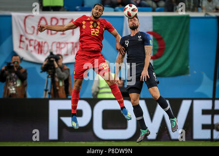 St. Petersburg, Russia. 10th July, 2018. Nacer Chadli from Belgium and Olivier Giroud from France during the match between France and Belgium valid for the semi final of the 2018 World Cup, held at the Krestovsky Stadium in St Petersburg, Russia. France wins 1-0. Credit: Thiago Bernardes/Pacific Press/Alamy Live News Stock Photo