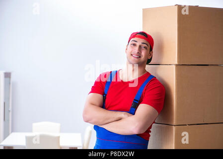 Contractor worker moving boxes during office move Stock Photo