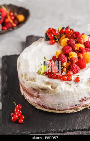 Healthy vegan cake with coconut cream and berries. Healthy vegan food (dessert) concept. Stock Photo