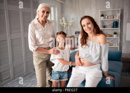 Three generations having no gap in communication Stock Photo