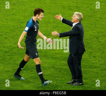 SAINT PETERSBURG, RUSSIA - JULY 10: France national team head coach Didier Deschamps (R) and Benjamin Pavard celebrate victory during the 2018 FIFA World Cup Russia Semi Final match between France and Belgium at Saint Petersburg Stadium on July 10, 2018 in Saint Petersburg, Russia. MB Media Stock Photo