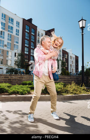 Nice joyful couple having fun Stock Photo
