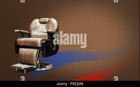 Stylish Vintage Barber Chair Isolated On Brown Background. Barbershop Theme Stock Photo
