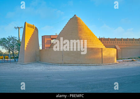 The old adobe construction, shaped as the spiral dome, served as the evaporative cooler, Kerman, Iran. Stock Photo