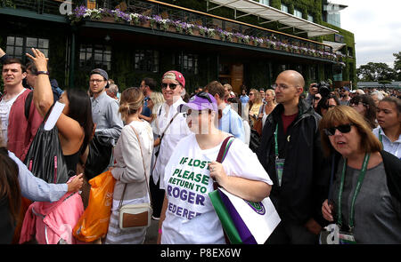 A Roger Federer fan at the start of day nine of the Wimbledon Championships at the All England Lawn Tennis and Croquet Club, Wimbledon. Stock Photo