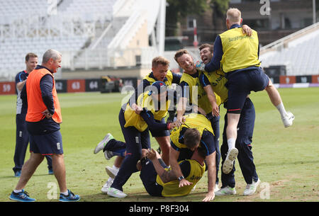 England players celebrate after their penalty shoot out warm up during the nets session at Trent Bridge, Nottingham. Stock Photo