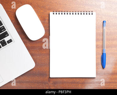 Top View Of Spiral Blank Notebook On Wood Desk Background Stock