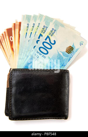 brown leather purse and several shekel banknotes sticking out of it isolated on a white background Stock Photo
