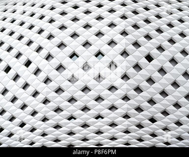 Geometric architectural absract background. Section of a modern building with squared mosaic design and curved wall. Stock Photo