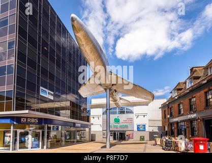 Hawker Hunter aircraft mounted on a pole outside the Big Apple entertainment centre in Crown Square, Woking town centre, Surrey, UK Stock Photo