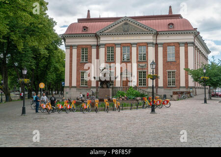 TURKU, FINLAND - 8/7/2018: Town main library and the popular föli city bicycles on summer day. Stock Photo