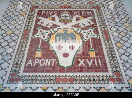 Pope Pius XI mosaic coat of arms in the Basilica of Saint John Lateran in Rome. Stock Photo