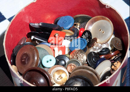 many buttons in can on chess board Stock Photo