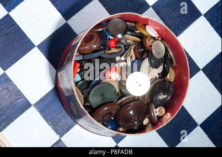 many buttons in can on chess board Stock Photo