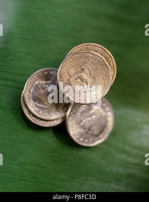 5 American Dollar Coins Green Stock Photo