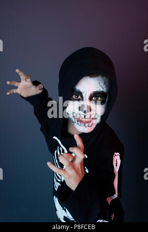 Portrait of a boy dressed up as a skeleton Stock Photo