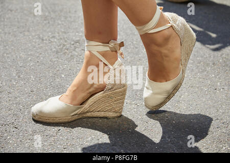 MILAN - 16: Woman with high heel espadrilles shoes in color before Marni fashion show, Milan Fashion Week street style on June 16, 2018 in Stock Photo - Alamy