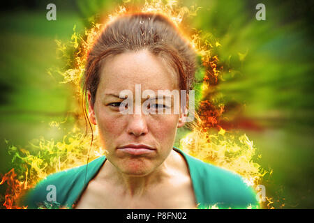Very angry woman on fire Stock Photo