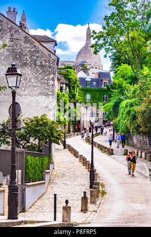 The winding famous Rue de l'Abreuvoir in Montmartre offers