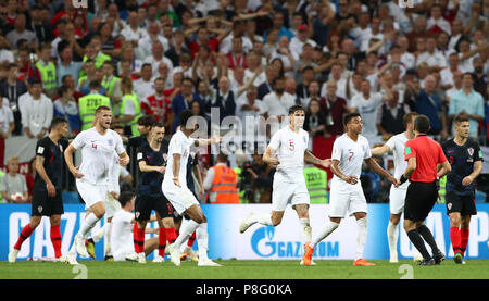 England players question a decision with referee Cuneyt Cakir during the FIFA World Cup, Semi Final match at the Luzhniki Stadium, Moscow. PRESS ASSOCIATION Photo. Picture date: Wednesday July 11, 2018. See PA story WORLDCUP Croatia. Photo credit should read: Tim Goode/PA Wire. RESTRICTIONS: Editorial use only. No commercial use. No use with any unofficial 3rd party logos. No manipulation of images. No video emulation. Stock Photo