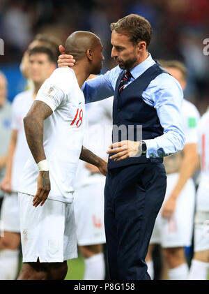 England manager Gareth Southgate embraces Ashley Young after the FIFA World Cup, Semi Final match at the Luzhniki Stadium, Moscow. Stock Photo