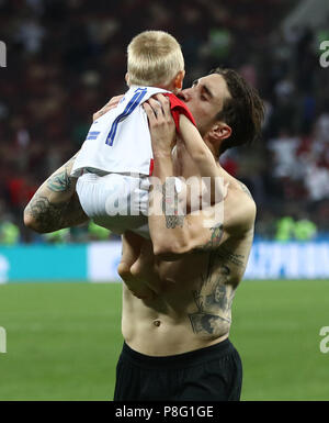 Croatia's Sime Vrsaljko celebrates with his family after his side win the FIFA World Cup, Semi Final match at the Luzhniki Stadium, Moscow. Stock Photo